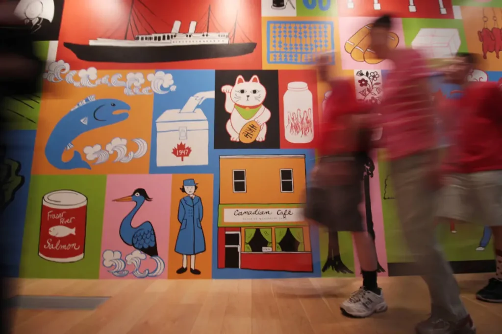 People walk through the Chinese Canadian Museum in Vancouver’s Chinatown Saturday (July 1, 2023) during the first public opening day of the museum. (Lauren Collins)