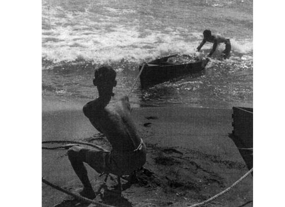 Operation Oblivion operatives and cousins Hank and Norm Wong, practicing beach landings Oro Bay, New Guinea